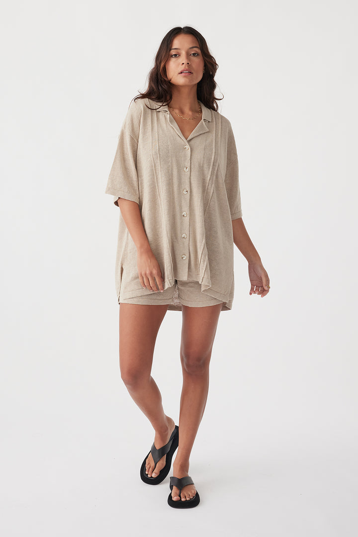 Oversized shirt style, Open collar, Front pleat detail, Linen knit, Button down, Minimal waste knit construction, Soft 